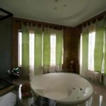 Residência Espaçosa de Dois Pavimentos com Acabamento Refinado e Ampla Área de Lazer em Heliópolis, BH
